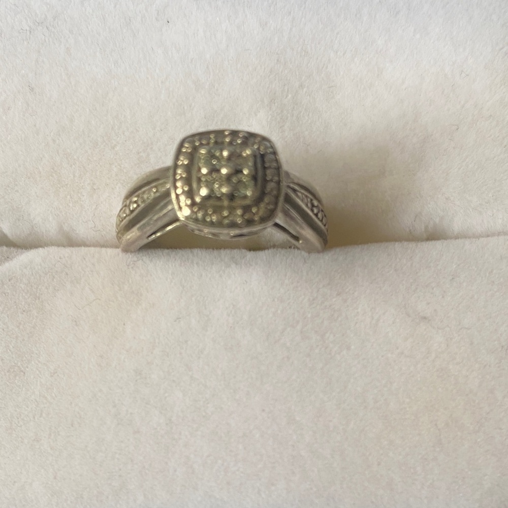 Elegant Silver Ring with Diamond Accents